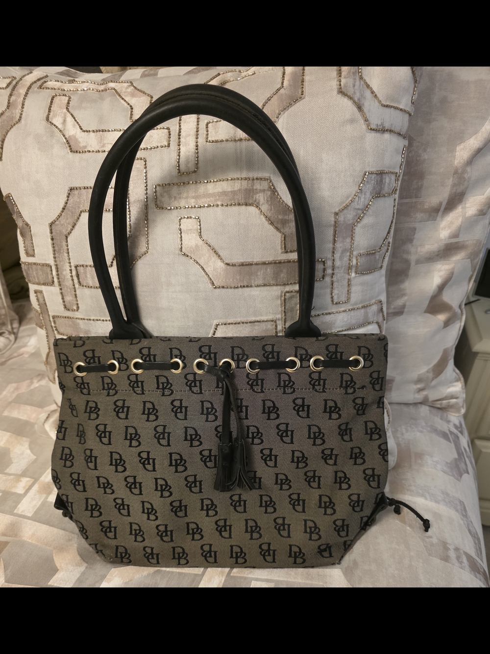 Dooney & Bourke Logo Canvas Tote Tassel Accent Black Handles Gold Hardware
